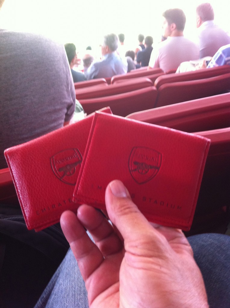 Arsenal season tickets. They come in these cool red leather pouches. The whole pouch gets put in the scanner to open the turnstile.