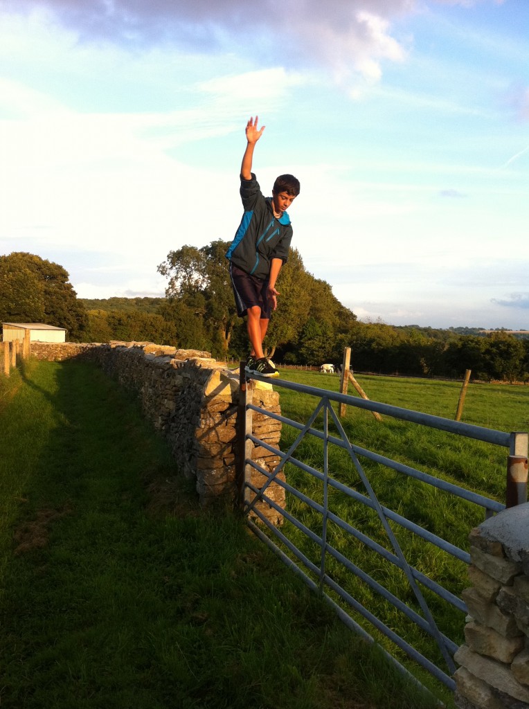 Jordan practicing to join the Gifford Circus.  Everywhere there were stone walls and gates to walk across.