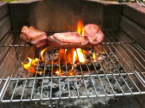 Duck breasts grilled over a walnut wood fire