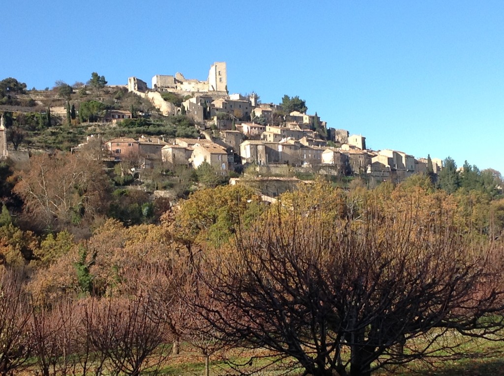 The town of Lacoste. The chateau once belonged to the Marquis de Sade. We took pics under cloud cover, then waited 15 minutes for the dark clouds of the